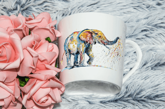  Beautiful Rainbow Splashed Elephant Mug by Free Spirit Accessories sold by Free Spirit Accessories